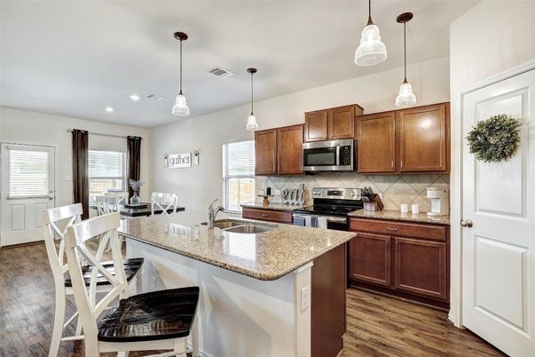 Dining room, Interior, Kitchen, Pendant Lights, Recessed Lighting, Stainless Steel Appliances, Wood Texture Flooring