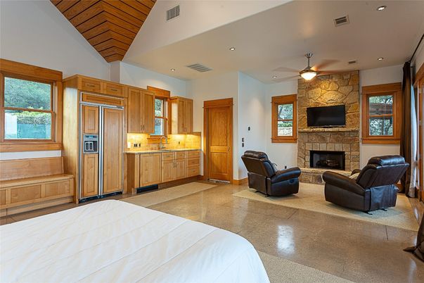 Bedroom, Fireplace, Interior, Kitchen, Recessed Lighting, Stone Walls, Wooden Ceilings