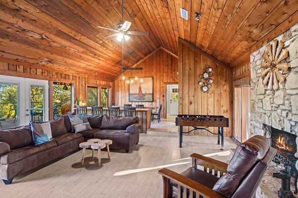 Fireplace, Game Room, Interior, Living room, Pendant Lights, Stone Walls, Wooden Ceilings, Wood Texture Flooring, Wooden Walls