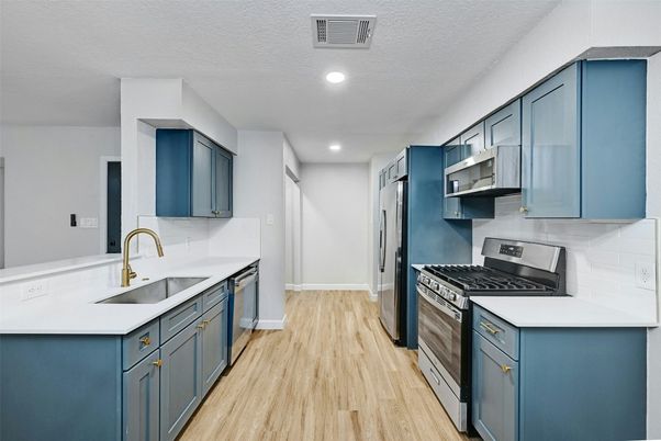 Interior, Kitchen, Recessed Lighting, Stainless Steel Appliances, Wood Texture Flooring