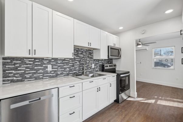 Interior, Kitchen, Recessed Lighting, Stainless Steel Appliances, Wood Texture Flooring