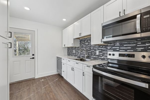 Interior, Kitchen, Recessed Lighting, Stainless Steel Appliances, Wood Texture Flooring