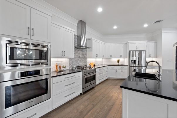 Interior, Kitchen, Recessed Lighting, Stainless Steel Appliances, Wood Texture Flooring