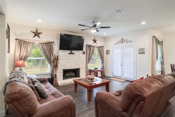 Fireplace, Interior, Living room, Recessed Lighting, Wood Texture Flooring