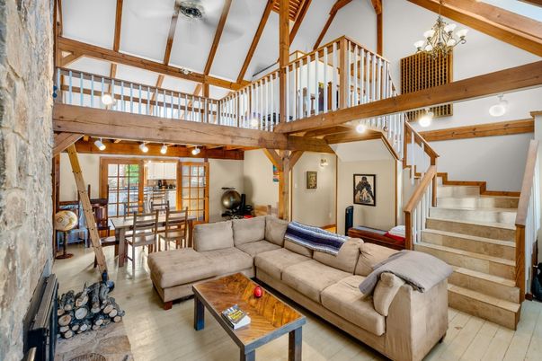 Chandelier, Dining room, Fireplace, Interior, Living room, Wooden Beams, Wood Texture Flooring