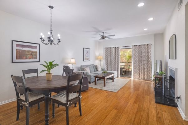 Chandelier, Dining room, Fireplace, Interior, Living room, Recessed Lighting, Wood Texture Flooring