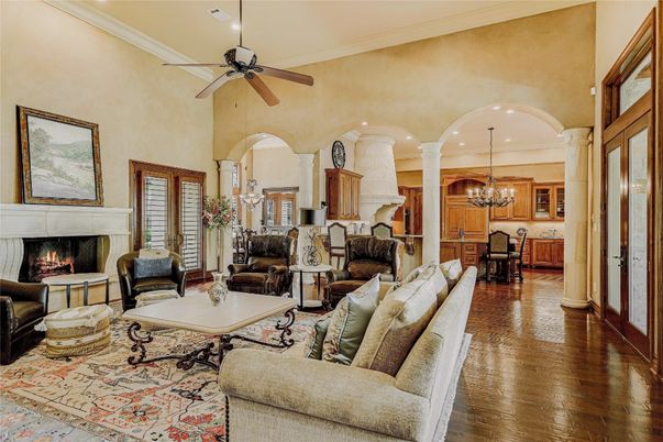 Chandelier, Dining room, Fireplace, Interior, Kitchen, Living room, Recessed Lighting, Wood Texture Flooring