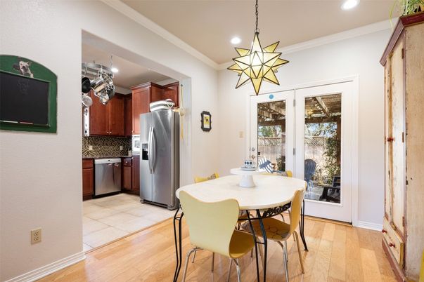 Dining room, Interior, Kitchen, Pendant Lights, Recessed Lighting, Stainless Steel Appliances, Wood Texture Flooring