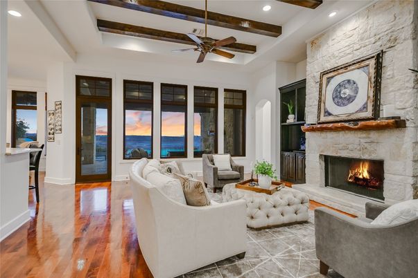 Fireplace, Interior, Living room, Recessed Lighting, Stone Walls, Water, Wooden Beams, Wood Texture Flooring
