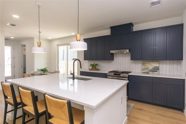 Interior, Kitchen, Pendant Lights, Recessed Lighting, Stainless Steel Appliances, Wood Texture Flooring