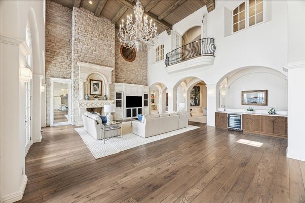 Chandelier, Fireplace, Interior, Living room, Recessed Lighting, Stone Walls, Wooden Beams, Wooden Ceilings, Wood Texture Flooring