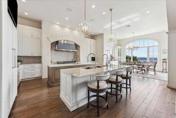 Chandelier, Dining room, Interior, Kitchen, Pendant Lights, Recessed Lighting, Stainless Steel Appliances, Wood Texture Flooring