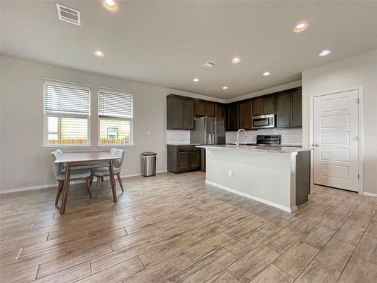 Dining room, Interior, Kitchen, Recessed Lighting, Stainless Steel Appliances, Wood Texture Flooring
