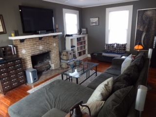 Fireplace, Interior, Living room, Recessed Lighting, Stone Walls, Wood Texture Flooring
