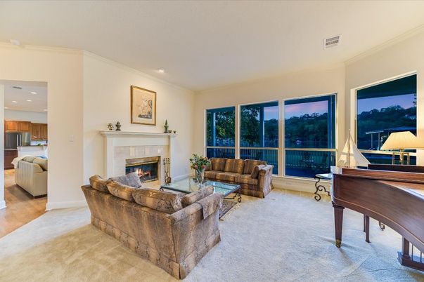Fireplace, Interior, Living room, Piano, Recessed Lighting, Wood Texture Flooring