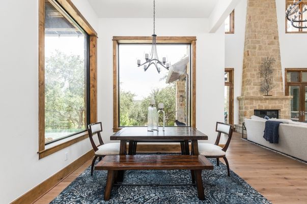 Chandelier, Dining room, Fireplace, Interior, Pendant Lights, Stone Walls, Wood Texture Flooring