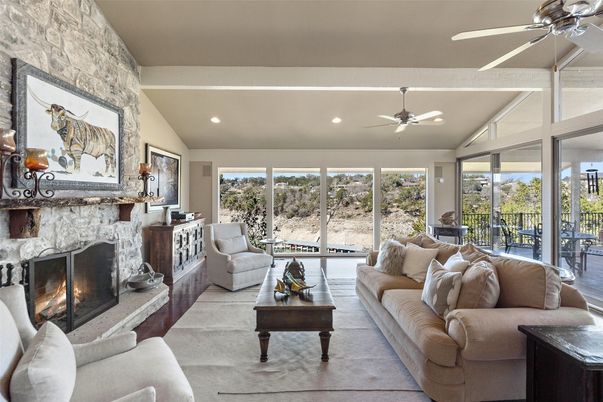 Fireplace, Interior, Living room, Recessed Lighting, Stone Walls, Wood Texture Flooring