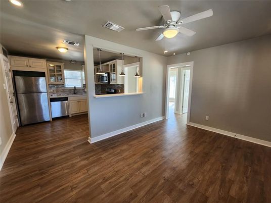 Empty room, Interior, Kitchen, Stainless Steel Appliances, Wood Texture Flooring