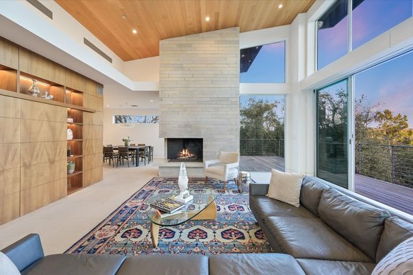 Dining room, Fireplace, Interior, Living room, Recessed Lighting, Stone Walls, Wooden Ceilings