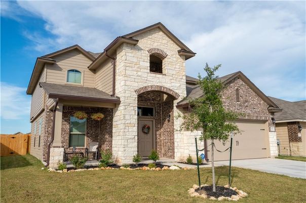 Attached, Exterior, Facade, Brick Facade, Brick Traditional