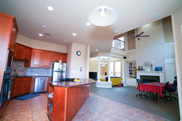 Dining room, Fireplace, Interior, Kitchen, Pendant Lights, Recessed Lighting, Stainless Steel Appliances