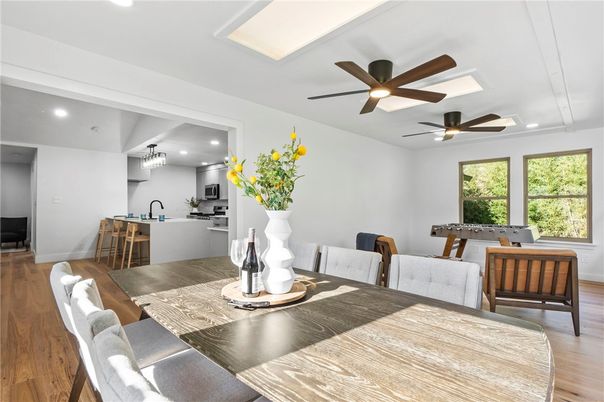 Dining room, Interior, Kitchen, Pendant Lights, Recessed Lighting, Stainless Steel Appliances, Wood Texture Flooring