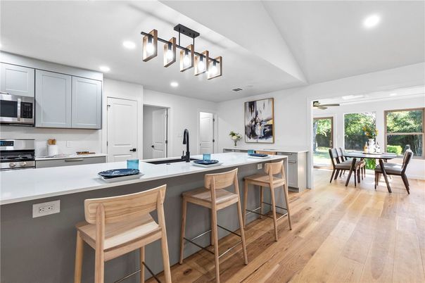 Dining room, Interior, Kitchen, Recessed Lighting, Stainless Steel Appliances, Wood Texture Flooring