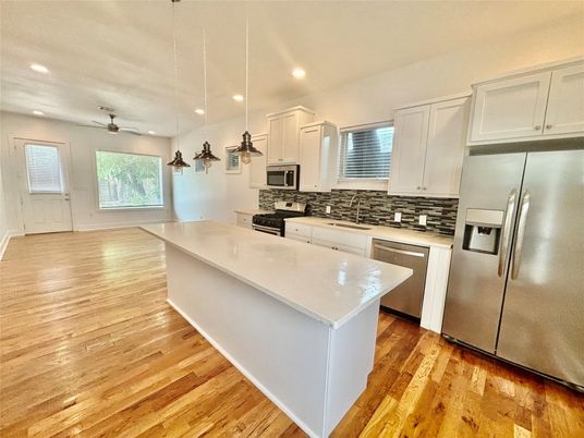 Interior, Kitchen, Pendant Lights, Recessed Lighting, Stainless Steel Appliances, Wood Texture Flooring