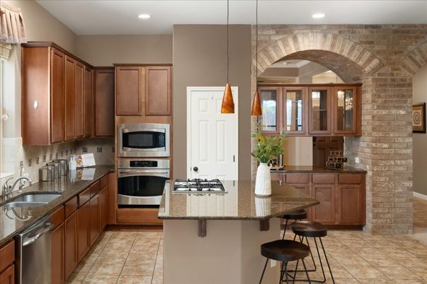 Interior, Kitchen, Pendant Lights, Recessed Lighting, Stainless Steel Appliances, Stone Walls