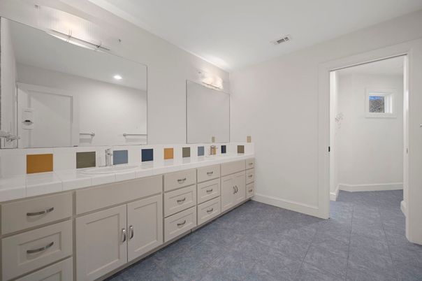 Bathroom, Dual Sink Vanities, Interior, Recessed Lighting, Tile Countertops