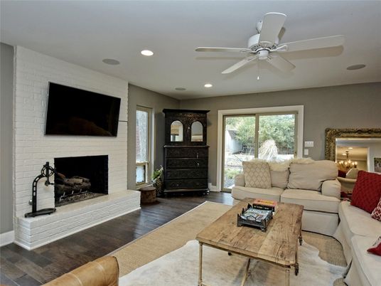 Fireplace, Interior, Living room, Recessed Lighting, Stone Walls, Wood Texture Flooring