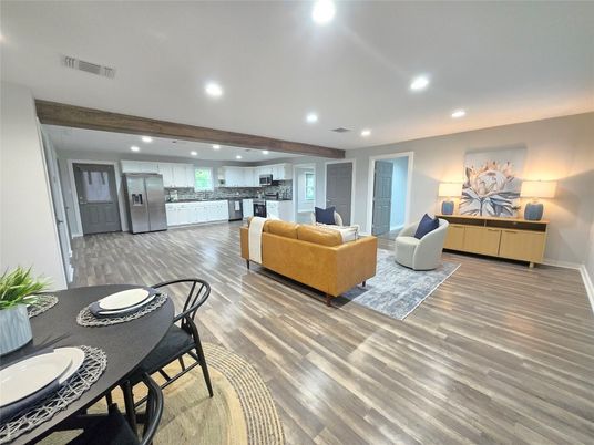 Dining room, Interior, Kitchen, Living room, Recessed Lighting, Stainless Steel Appliances, Wood Texture Flooring