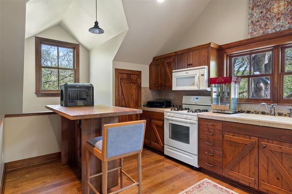 Interior, Kitchen, Pendant Lights, Recessed Lighting, Tile Countertops, Wood Texture Flooring