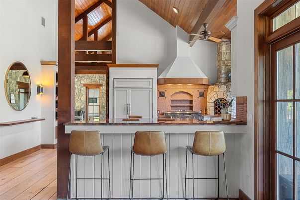 Fireplace, Interior, Recessed Lighting, Stone Walls, Wood Texture Flooring