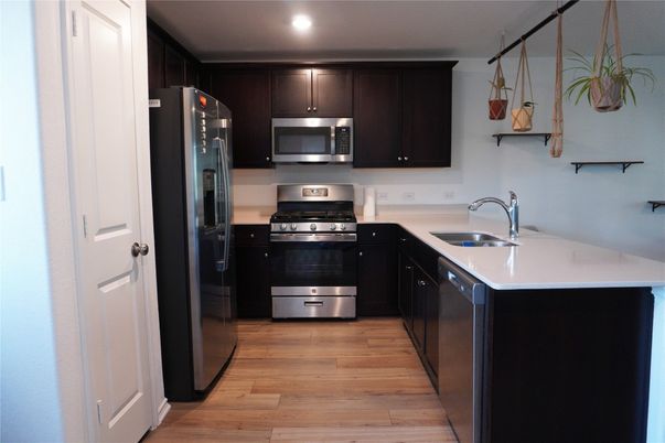 Interior, Kitchen, Recessed Lighting, Stainless Steel Appliances, Wood Texture Flooring