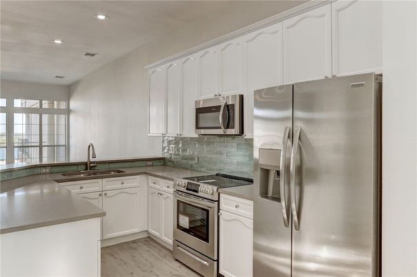 Interior, Kitchen, Recessed Lighting, Stainless Steel Appliances, Wood Texture Flooring