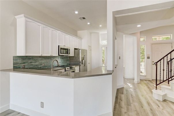 Interior, Kitchen, Recessed Lighting, Stainless Steel Appliances, Wood Texture Flooring