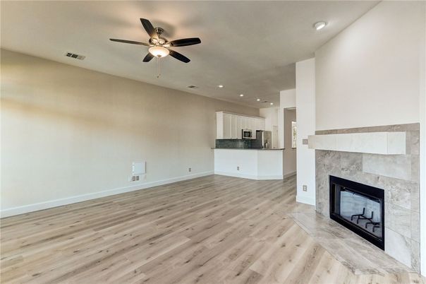 Empty room, Fireplace, Interior, Recessed Lighting, Wood Texture Flooring