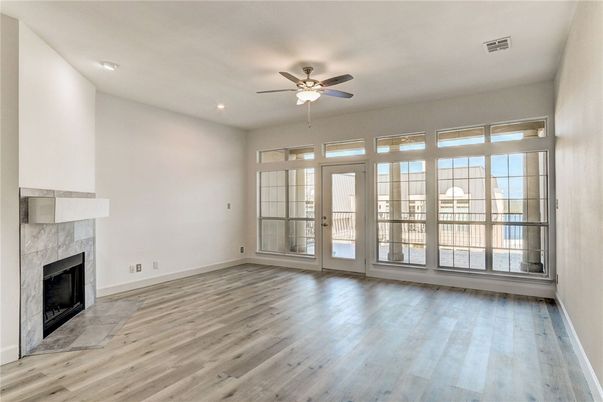 Empty room, Fireplace, Interior, Recessed Lighting, Wood Texture Flooring