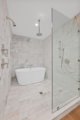 Bathroom, Free Standing Baths, Glass Shower, Interior, Marble Walls, Recessed Lighting