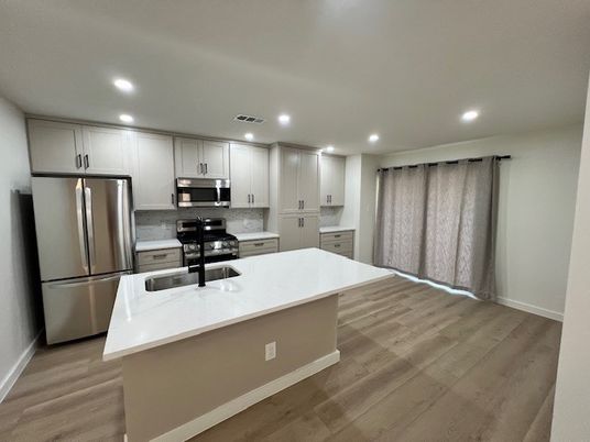 Interior, Kitchen, Recessed Lighting, Stainless Steel Appliances, Wood Texture Flooring