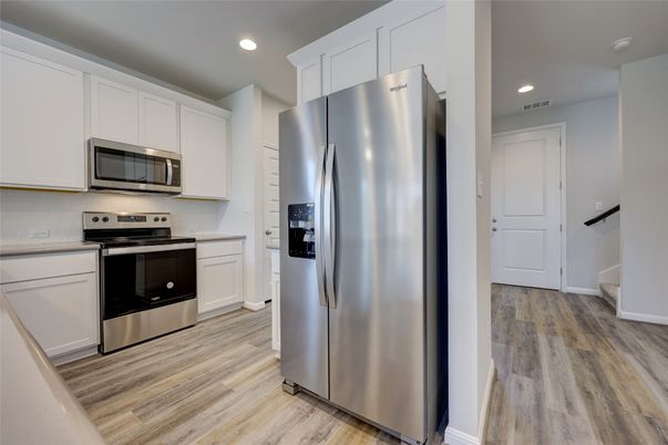 Interior, Kitchen, Recessed Lighting, Stainless Steel Appliances, Wood Texture Flooring
