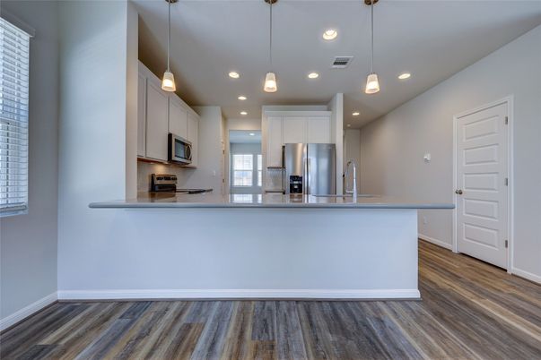Interior, Kitchen, Pendant Lights, Recessed Lighting, Stainless Steel Appliances, Wood Texture Flooring