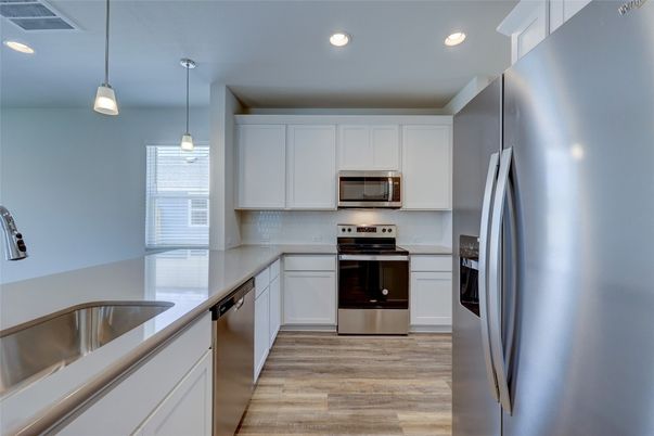 Interior, Kitchen, Pendant Lights, Recessed Lighting, Stainless Steel Appliances, Wood Texture Flooring