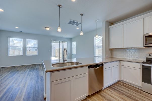 Interior, Kitchen, Pendant Lights, Recessed Lighting, Stainless Steel Appliances, Wood Texture Flooring