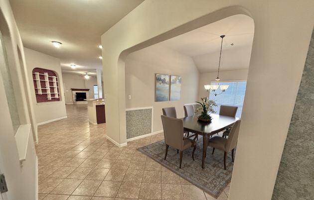 Chandelier, Dining room, Fireplace, Interior, Pendant Lights