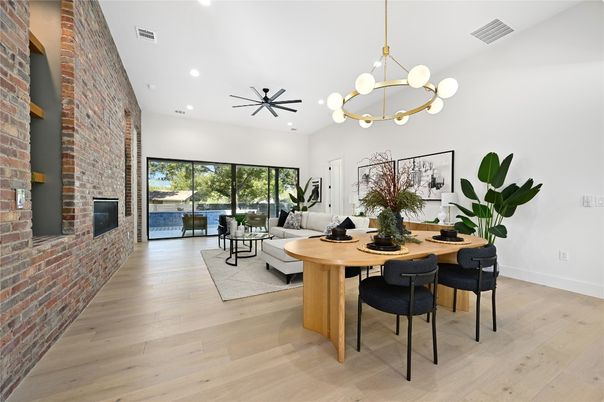 Dining room, Fireplace, Interior, Living room, Pendant Lights, Recessed Lighting, Stone Walls, Wood Texture Flooring