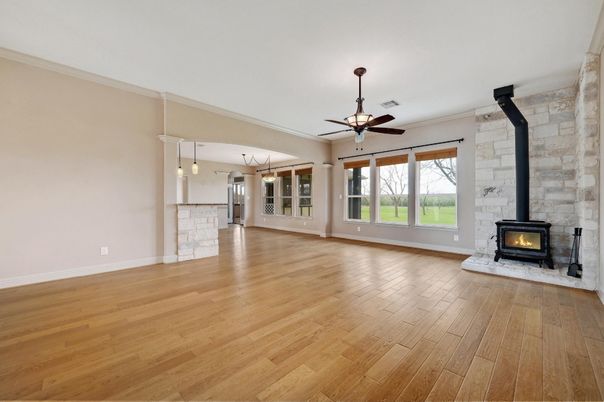 Empty room, Fireplace, Interior, Pendant Lights, Stone Walls, Wood Texture Flooring