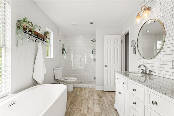 Bathroom, Dual Sink Vanities, Free Standing Baths, Glass Shower, Interior, Recessed Lighting, Wood Texture Flooring