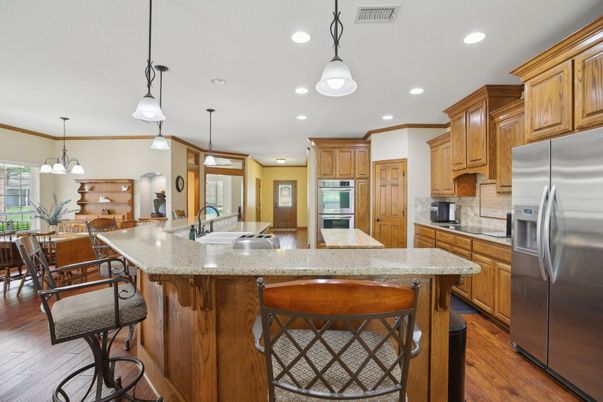 Dining room, Interior, Kitchen, Pendant Lights, Recessed Lighting, Stainless Steel Appliances, Wood Texture Flooring
